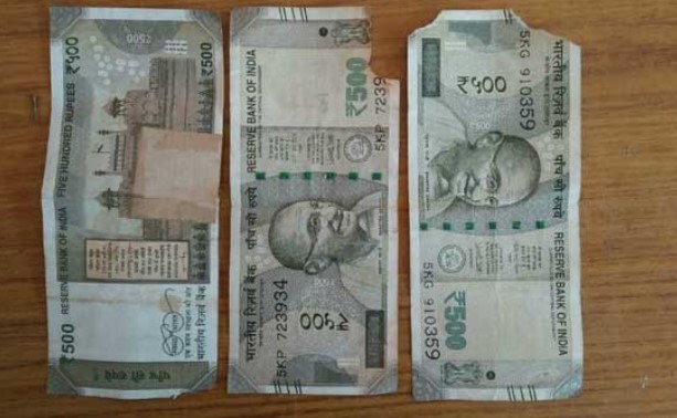 Rules and regulation set up by rbi for exchanging damaged or torn notes
